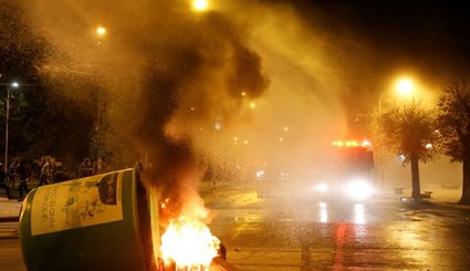 صور.. حرب شوارع بين الشرطة ومتظاهرين فى تشيلى
