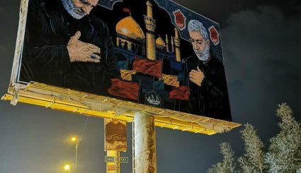 نصب پوسترهایی بزرگ از شهید سلیمانی و ابومهدی مهندس در عراق