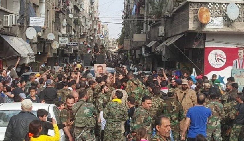 حشود عسكرية جنوب دمشق.. و