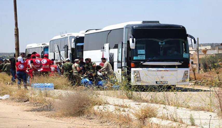 آغاز عملیات خروج تروریست‌ها از «درعا البلد» + عکس
