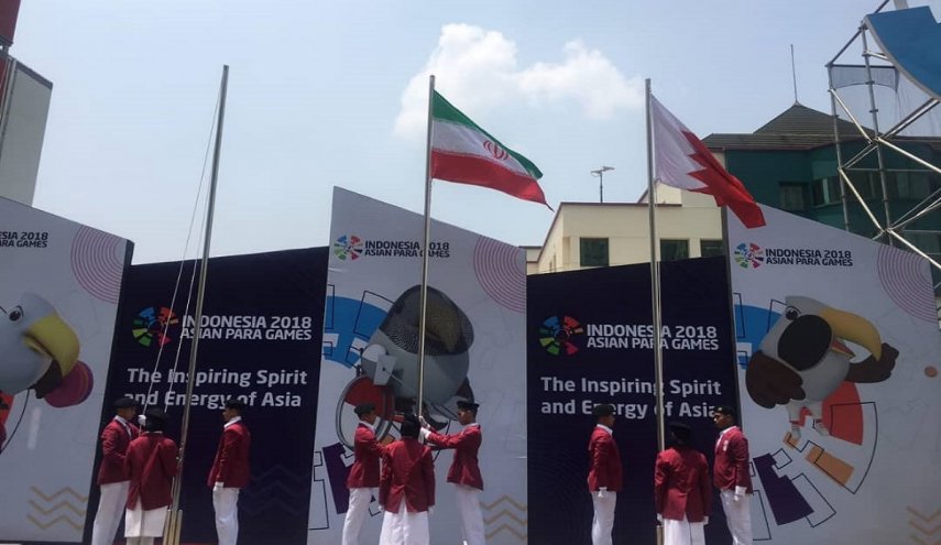 پرچم ایران در دهکده مسابقات به اهتزاز درآمد