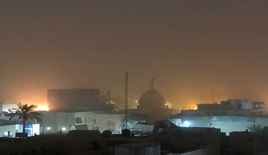 عاصفة ترابية تجتاح بغداد+صور