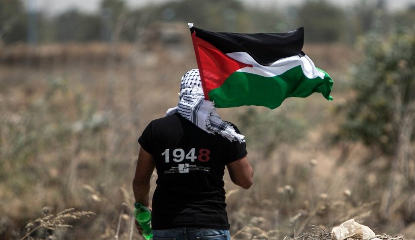 السجن لمن يرفع العلم الفلسطيني