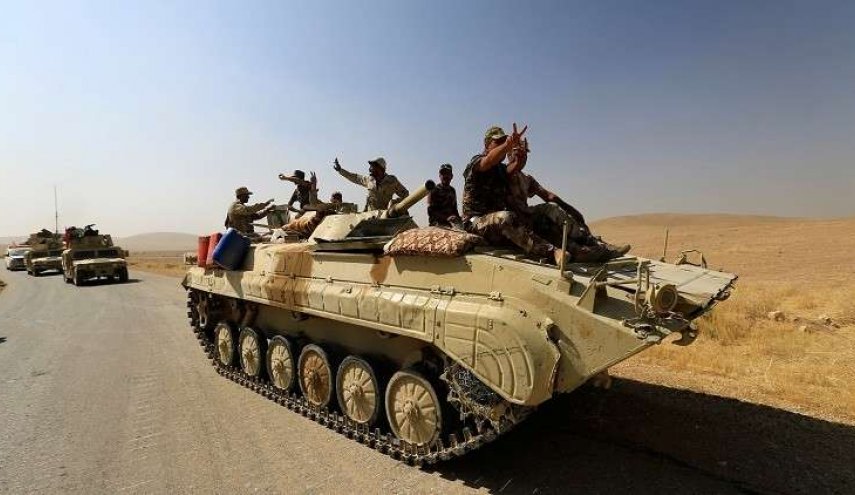 الأمن العراقي يضبط 11 شاحنة محملة بقطع غيار الدبابات