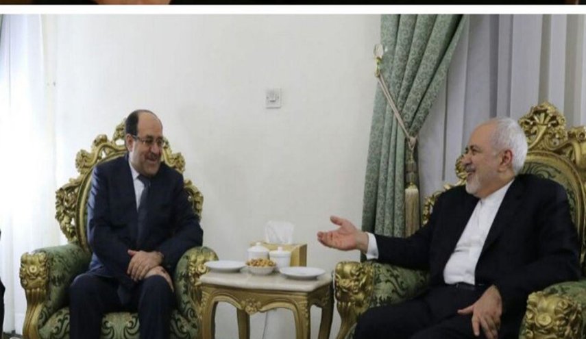 ظريف يستقبل نوري المالكي في السفارة الايرانية ببغداد
