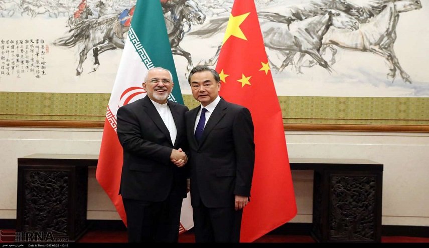 وزير الخارجية الصيني يؤكد عزم بلاده على التعاون مع ايران