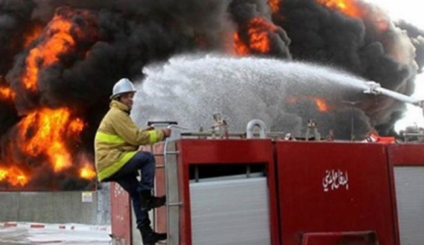 شاهد بالصور.. حريق ضخم يلتهم محال تجارية في بغداد 
