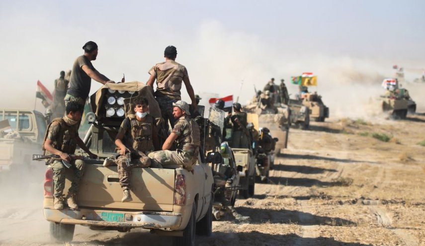 القوات الامنية والحشد الشعبي يعملان بخط واحد ضد داعش 