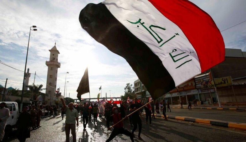 دست‌نوشته این معترض عراقی خطاب به کیست؟