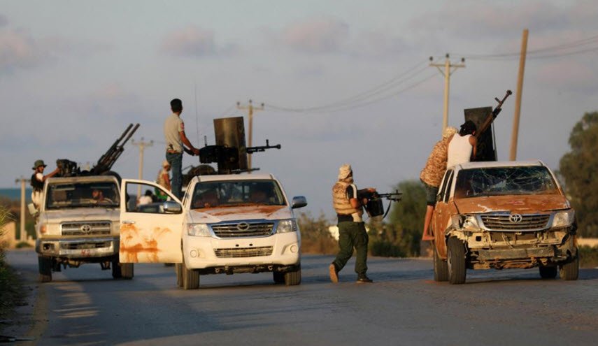 جاويش أوغلو: النظام الدولي ليس بمقدوره وقف القتال في ليبيا