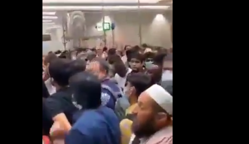 کثرت جمعیت در فرودگاه دبی برای تشخیص کرونا! + فیلم