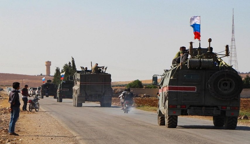 مسلحون يعترضون دورية روسية تركية على طريق حلب اللاذقية