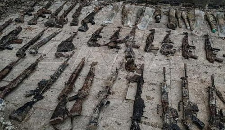 بالصور.. العثور على أسلحة وذخائر من مخلفات الإرهابيين بحمص