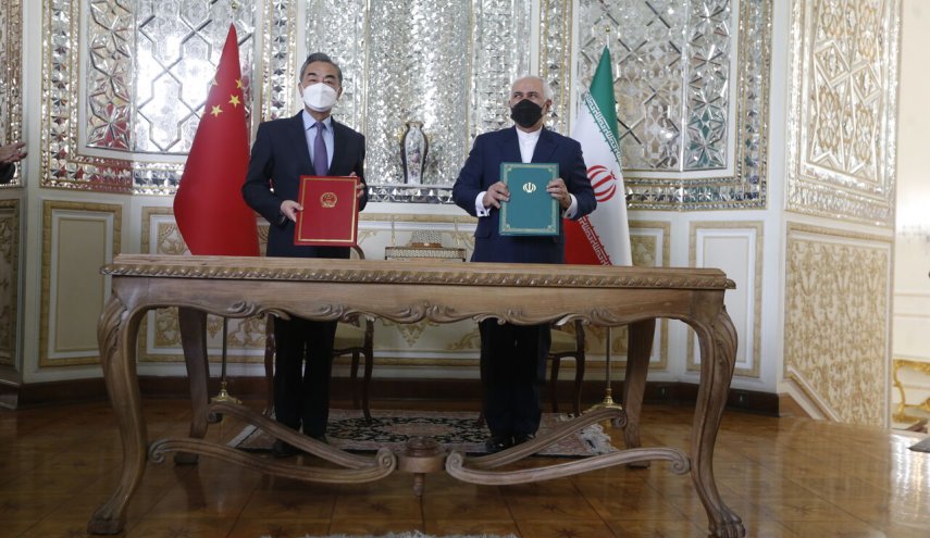 وزيرا خارجية إيران والصين يوقعان وثيقة شاملة للتعاون الاستراتيجي