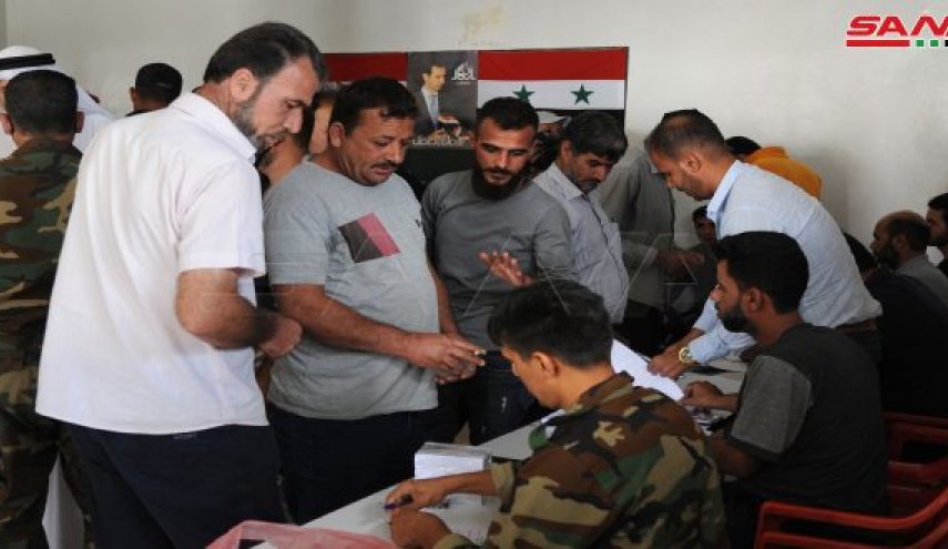  تسوية أوضاع عدد من المسلحين والمطلوبين في مدينة جاسم السوریة  