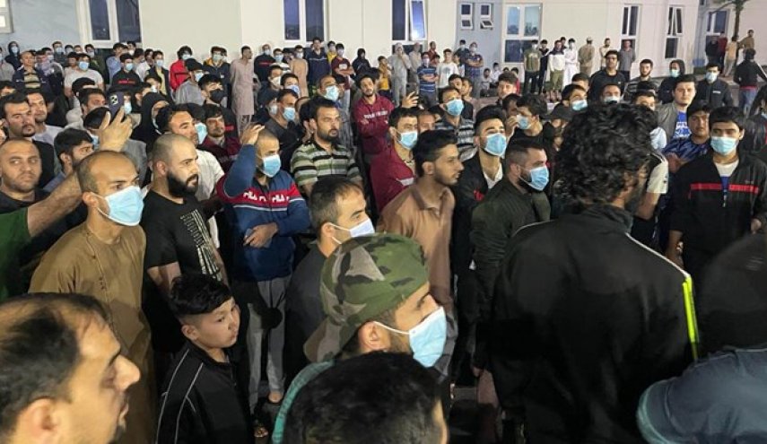 تظاهرات مهاجران افغانستانی در ابوظبی علیه آمریکا
