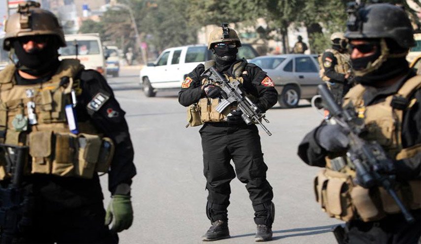 لهذا السبب.. قوة أمنية تقطع شارعاً وسط بغداد (صورة) 