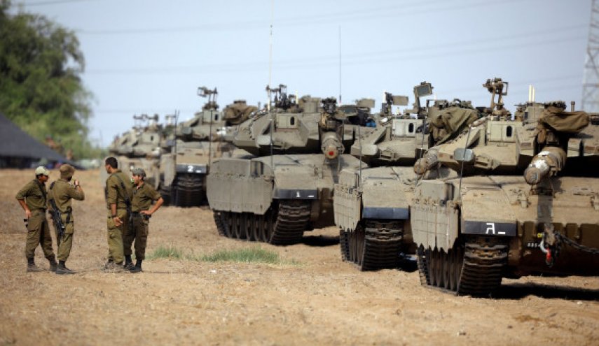 الإحتلال يعزز القوات البرية النظامية حول غزة خوفا من رد المقاومة