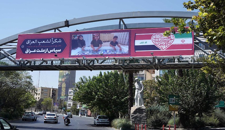 بالصور.. لوحات إعلانية تبرز تقدير الإيرانيین للشعب العراقي