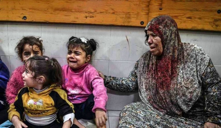 شاهد:جدار يحول لسجل مفتوح لأسماء أكثر من 18 ألف طفل شهيد بغزة