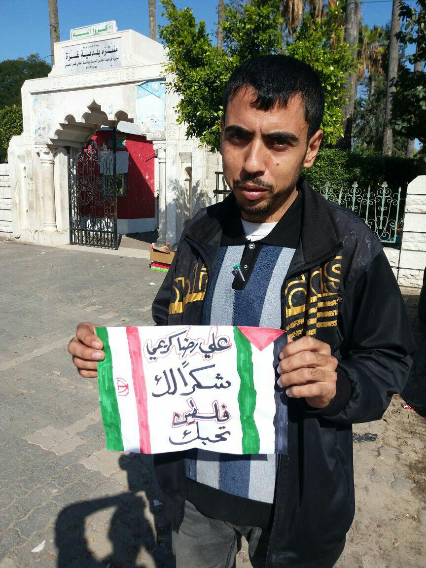 بالصور.. الفلسطينيون يدعمون القرار البطولي للمصارع الإيراني