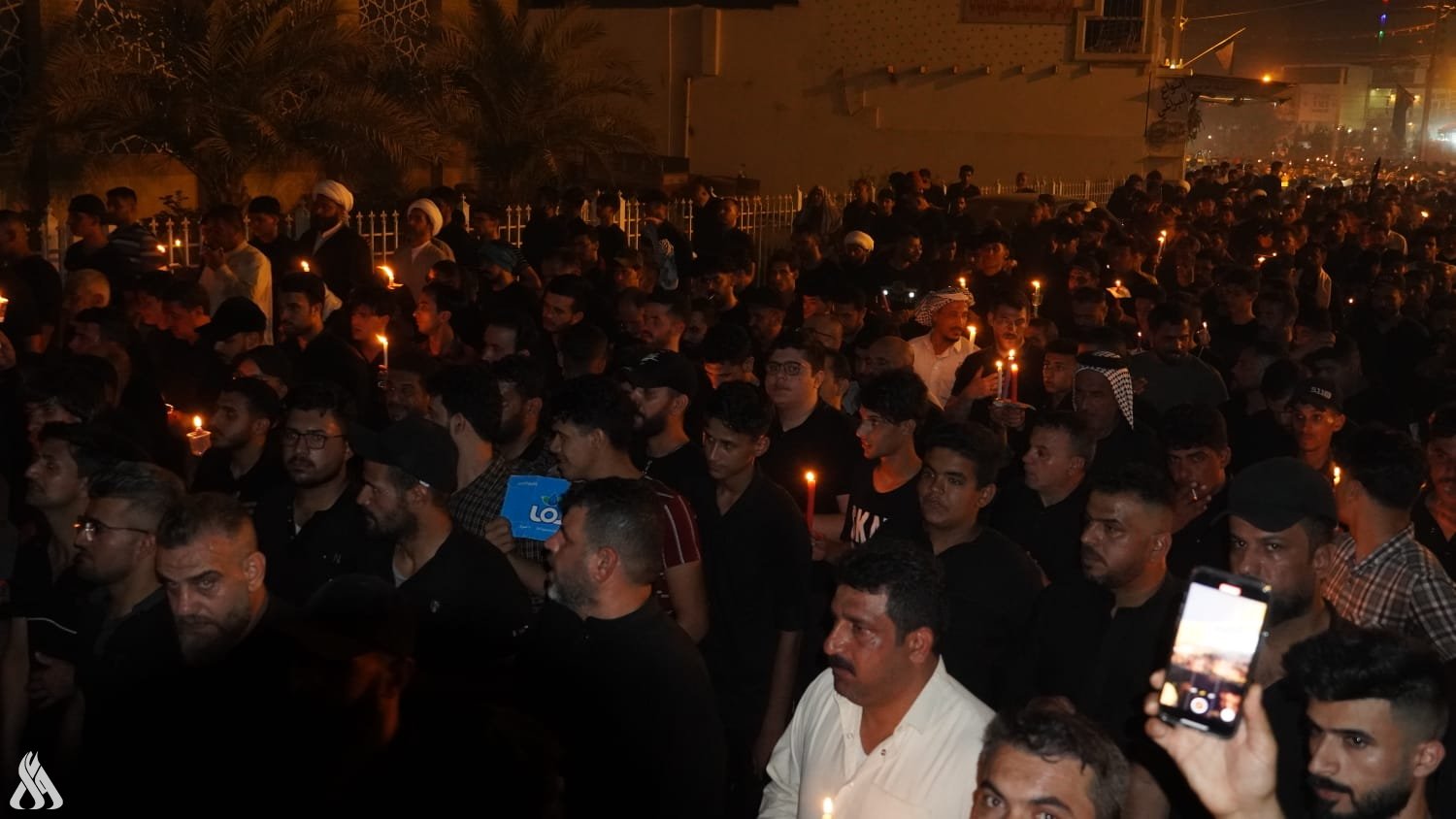 مسيرة الشموع بذكرى استشهاد السيد الصدر ونجليه +صور